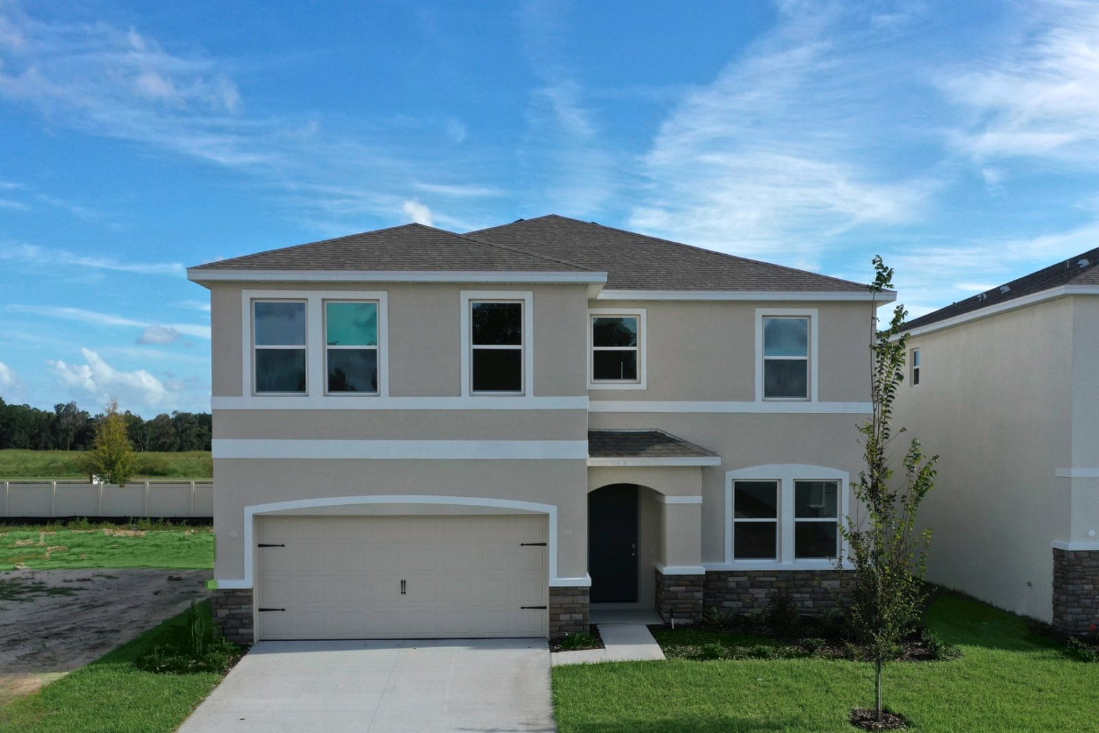 Coral plan — new construction home in Ridge at Heath Brook